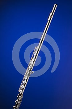 Silver Flute Isolated On Blue