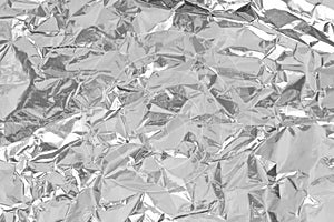 Silver foil leaf shiny texture, abstract grey wrapping paper for background and design art work