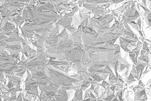 Silver foil leaf shiny texture, abstract grey wrapping paper for background and design art work