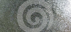 Silver Foil Texture Background with Distressed Metallic Surface and Subtle Light Reflection