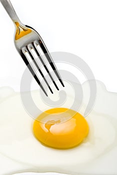 Silver Fork Pricking Broken Egg