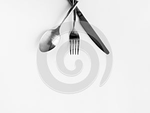 Silver fork, spoon, knife isolated on white