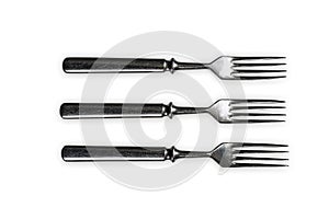 Silver forks on white background