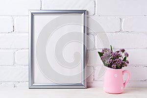 Silver frame mockup with purple flowers in pink rustic pitcher