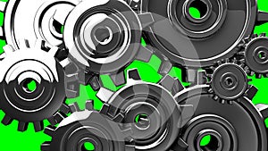 Silver gears on green chroma key background.