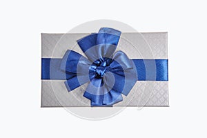 Silver Gift box with blue ribbon bow isolated on white background