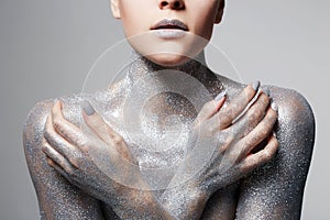 Silver Girl. Beautiful Woman in Sparkles