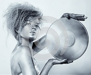 Silver girl with vinyl