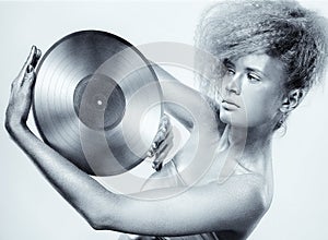 Silver girl with vinyl