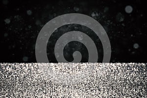 Silver glitter on black background