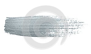 Silver glitter paint brush stroke or abstract dab smear with smudge texture on white background. Isolated glittering and sparkling