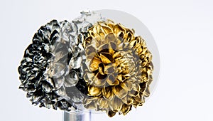 Silver and gold chrysanthemum flower in bottle. wealth and richness. floristics business. Vintage. luxury and success