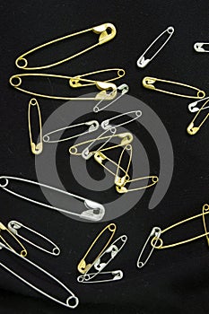 Silver and Gold safety pins