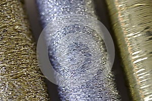Silver and gold  sewing thread
