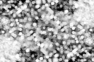 Silver and gray bokeh in dark abstract   background