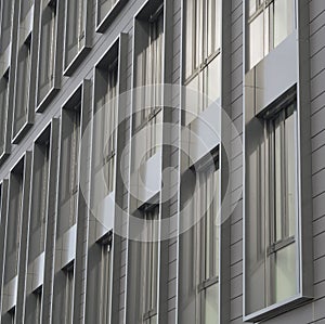 Silver gray windows of modern building architectonic detail