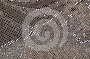 Silver grey polka dot sequined fabric background