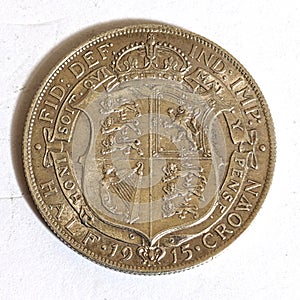 Silver Half Crown Coin Close Up on White Bckground
