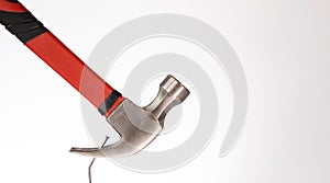 Silver Hammer & Nail on white background