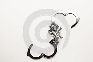 Silver handcuffs with heart shape