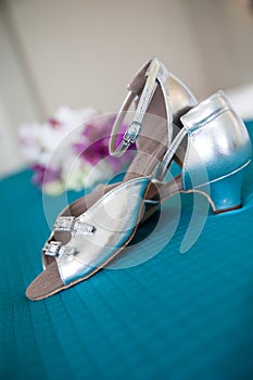 Silver high heeled shoes