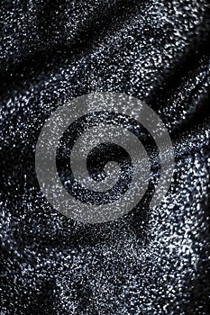 Silver holiday sparkling glitter abstract background, luxury shiny fabric material for glamour design and festive invitation photo