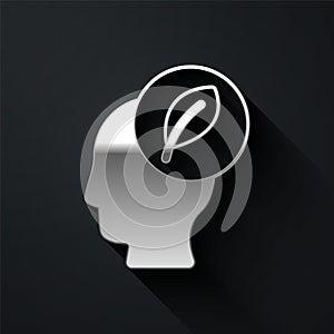 Silver Human head with leaf inside icon isolated on black background. Long shadow style. Vector