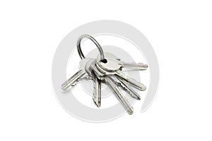 Silver keys on the ring on white background