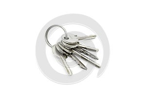 Silver keys on the ring on white background
