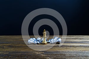 Silver king chess defeat and knocked down around golden king