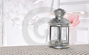 Silver Lantern with white light background can be used for Ramadan wishing designs and greeting card