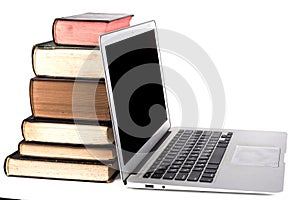 Silver Laptop and Books