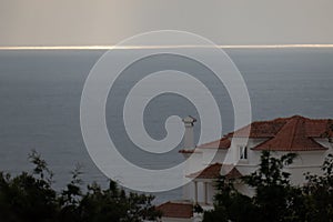 Silver lining setting sun, Ericeira, Portugal