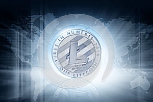 Silver litecoin coin on technology background