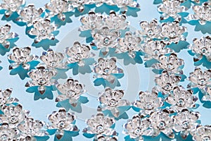 Silver Lotus flowers for embroidery, jewelry making, bag design. Scattering of metal flower beads