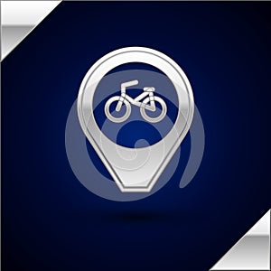Silver Map pointer with bicycle icon isolated on dark blue background. Vector