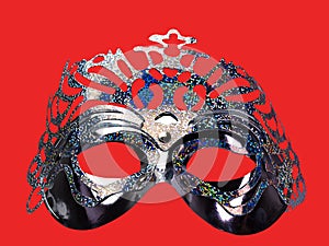 Silver mask on red background. clipping path