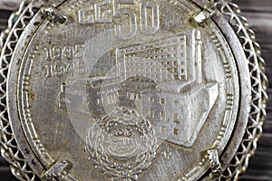 A silver medal with 5 Egyptian pounds silver non circulating coin as a commemoration of the golden Jubilee 50 years of the Arab photo