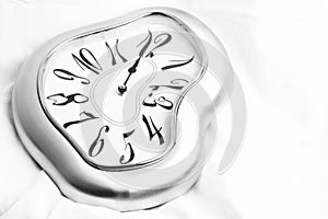 Silver melted clock photo