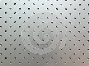 Silver metal sheet surface with small circle hole