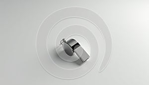 Silver metal whistle on a plain background, sports theme