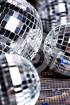 Silver mirror disco balls. New Year or Birthday party concept