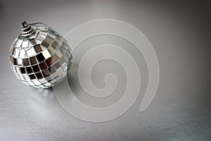 Silver mirror music club disco ball xmas festive Christmas ball, Christmas toy plastered on sparkles black and white background
