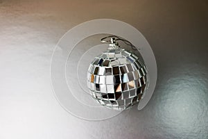 Silver mirror music club disco ball xmas festive Christmas ball, Christmas toy plastered on sparkles black and white background