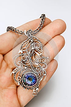 Silver mystic topaz feather pendant