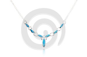 Silver necklace decorated by turquoise