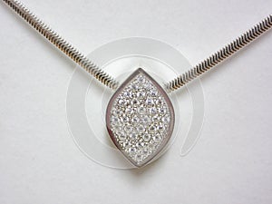 Silver necklace with inlaid diamonds