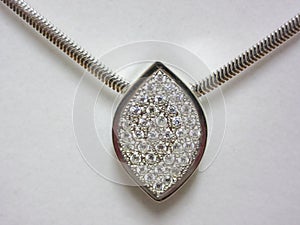 Silver necklace with inlaid diamonds