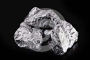 silver nugget native to Liberia isolated on black background