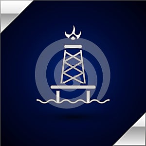 Silver Oil rig with fire icon isolated on dark blue background. Gas tower. Industrial object. Vector Illustration